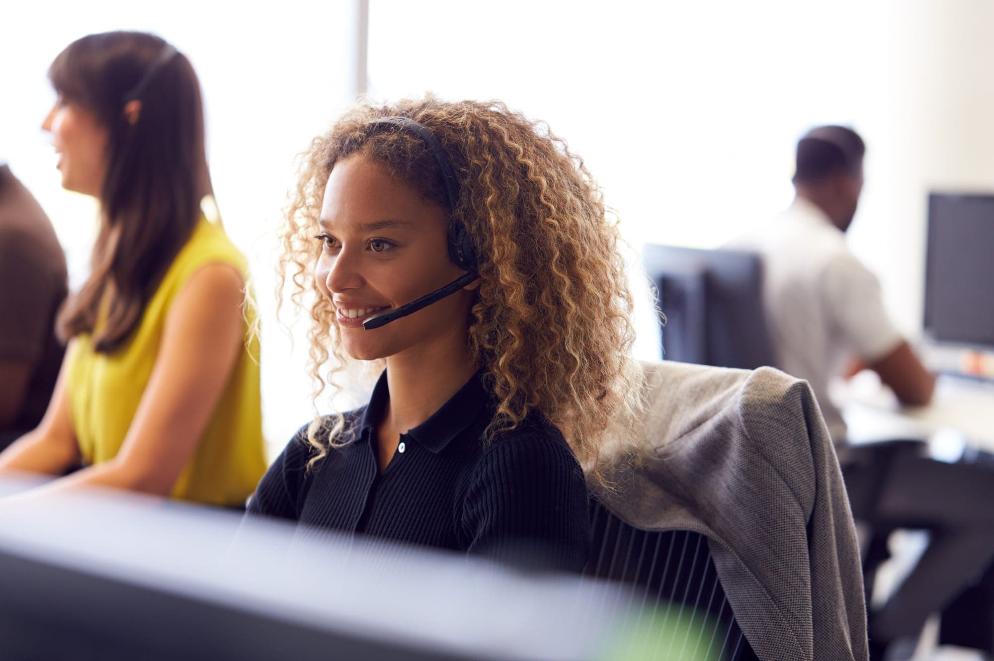 Friendly CCS support team taking customer calls